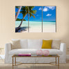 Tropical beach with palm trees, white sand, turquoise ocean water and blue sky at Palau Multi panel canvas wall art