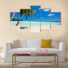 Tropical beach with palm trees, white sand, turquoise ocean water and blue sky at Palau Multi panel canvas wall art