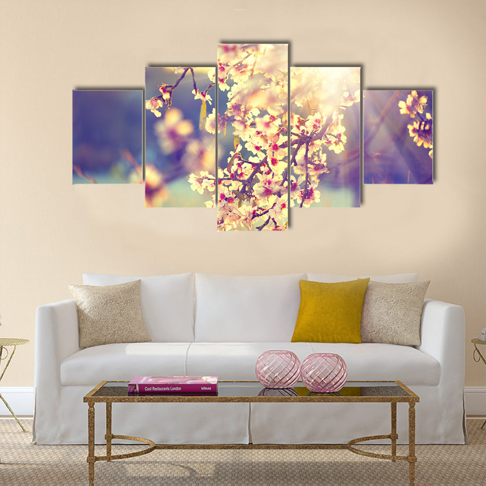 Beautiful nature scene with blooming tree and sun flare Multi panel canvas wall art