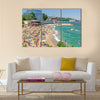 A crowded beach scene at the Golden Sands coastal resort in Bulgaria Multi panel canvas wall art