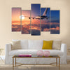 Passenger plane above the clouds multi panel canvas wall art