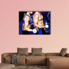 Bodybuilding couple against blue wave Multi panel canvas wall art