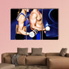 Bodybuilding couple against blue wave Multi panel canvas wall art