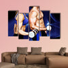 Bodybuilding couple against blue wave Multi panel canvas wall art