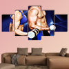 Bodybuilding couple against blue wave Multi panel canvas wall art