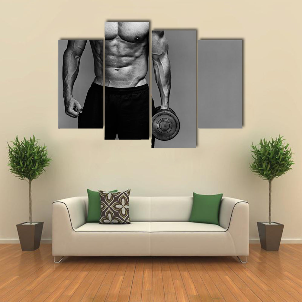 Close up of muscular bodybuilder guy doing exercises with weights over grey background