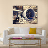 Engine of the airplane under heavy maintenance multi panel canvas wall art