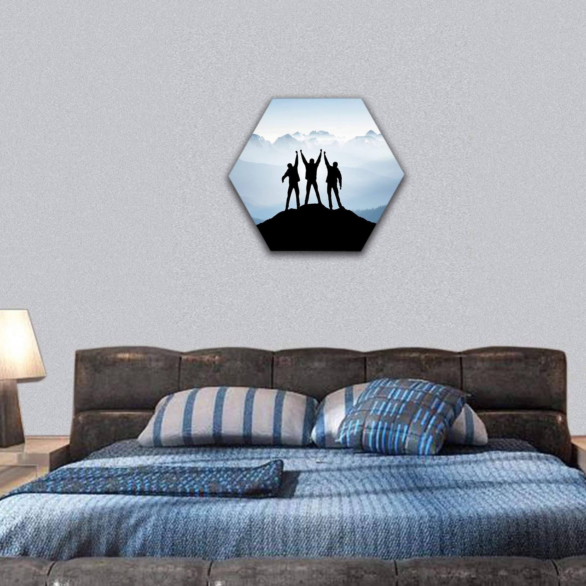 Team on mountain top hexagonal canvas wall art