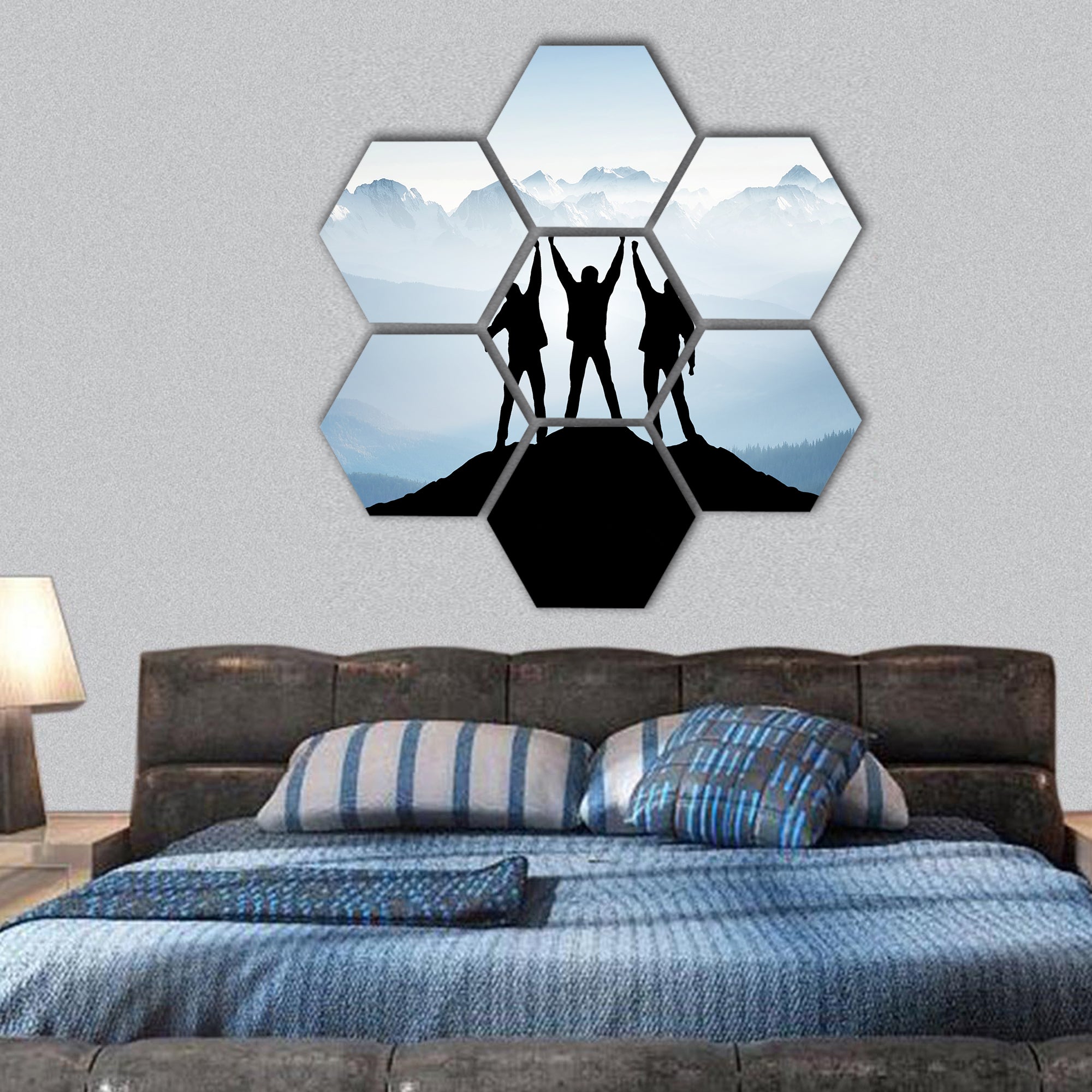 Team on mountain top hexagonal canvas wall art