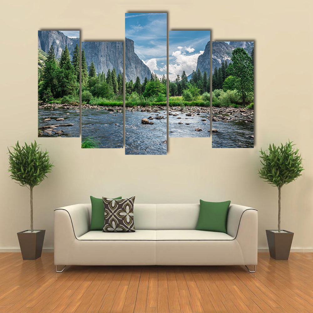 Dramatic skies surround the mountains as they seem to bow to the water below multi panel canvas wall art