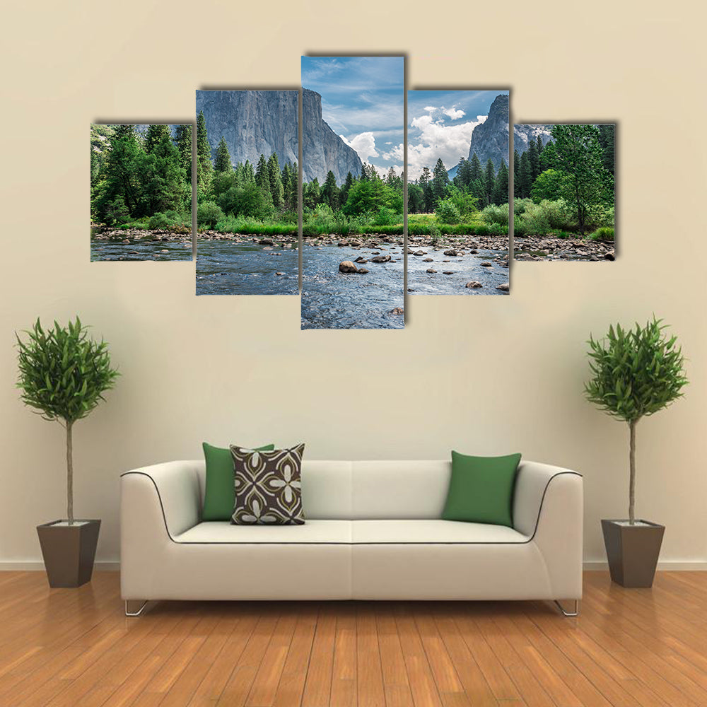 Dramatic skies surround the mountains as they seem to bow to the water below multi panel canvas wall art