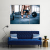 Close up portrait of a muscular man workout with barbell at gym, Multi panel canvas wall art