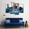 Close up portrait of a muscular man workout with barbell at gym, Multi panel canvas wall art