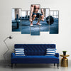 Close up portrait of a muscular man workout with barbell at gym, Multi panel canvas wall art