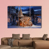 Gingerbread church on snowy Christmas night multi panel canvas wall art