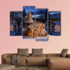 Gingerbread church on snowy Christmas night multi panel canvas wall art