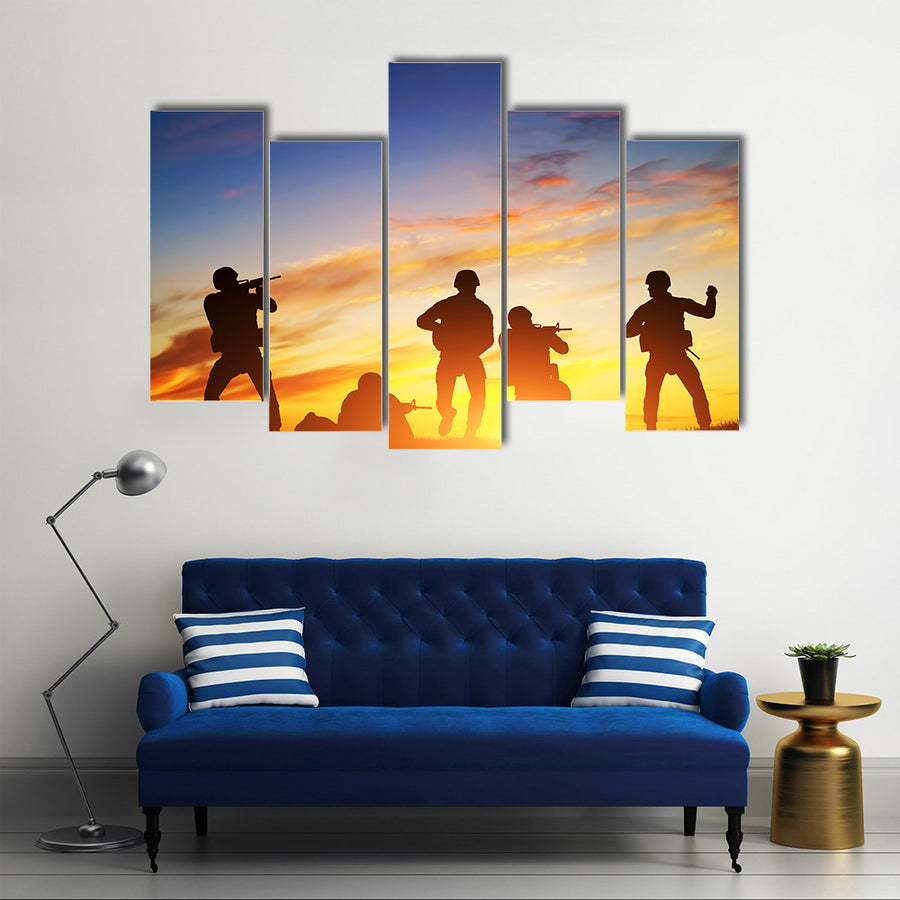 Soldiers Shooting With Weapons In An Exercise With A Rifle At Sunset, Multi Panel Canvas Wall Art