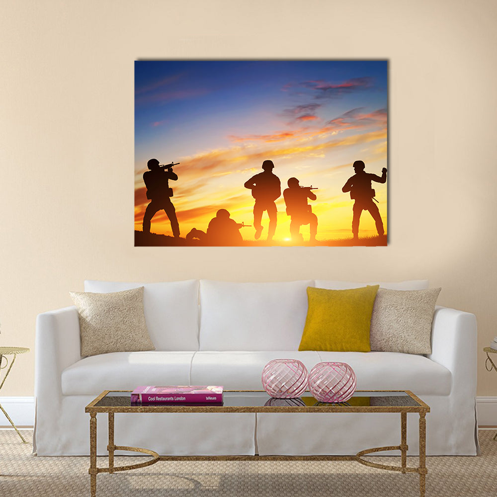 Soldiers in assault shooting with weapon, rifle at sunset. War, army, military Multi Panel Canvas Wall Art