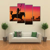 Wild west scene with horses and native American rider Multi panel canvas wall art