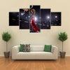 Basketball player in action Multi panel canvas wall art