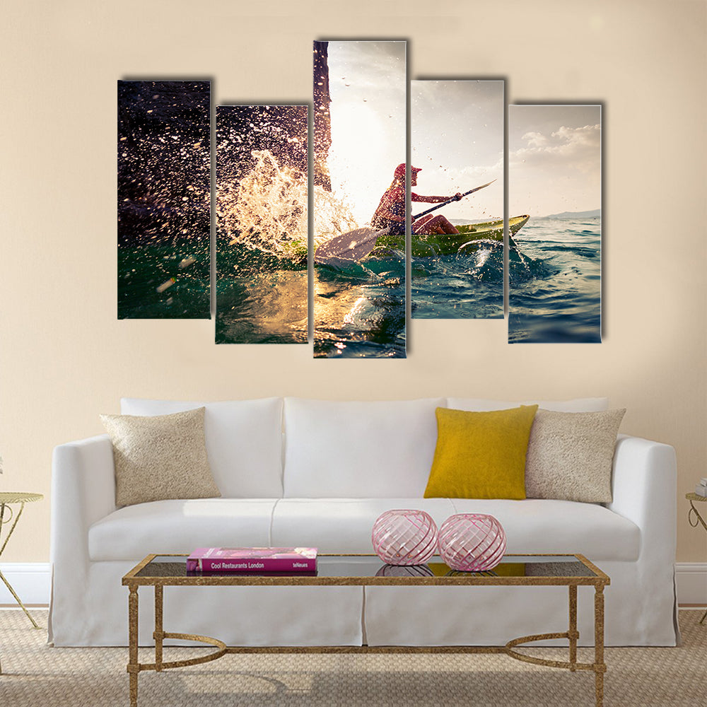Woman with the kayak multi panel canvas wall art