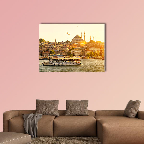 Tourist boat floats on the Golden Horn in Istanbul at sunset, canvas wall art