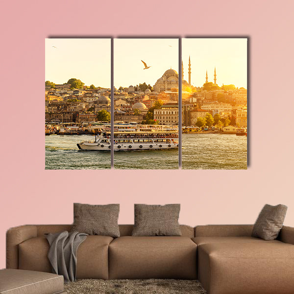 Tourist boat floats on the Golden Horn in Istanbul at sunset, canvas wall art