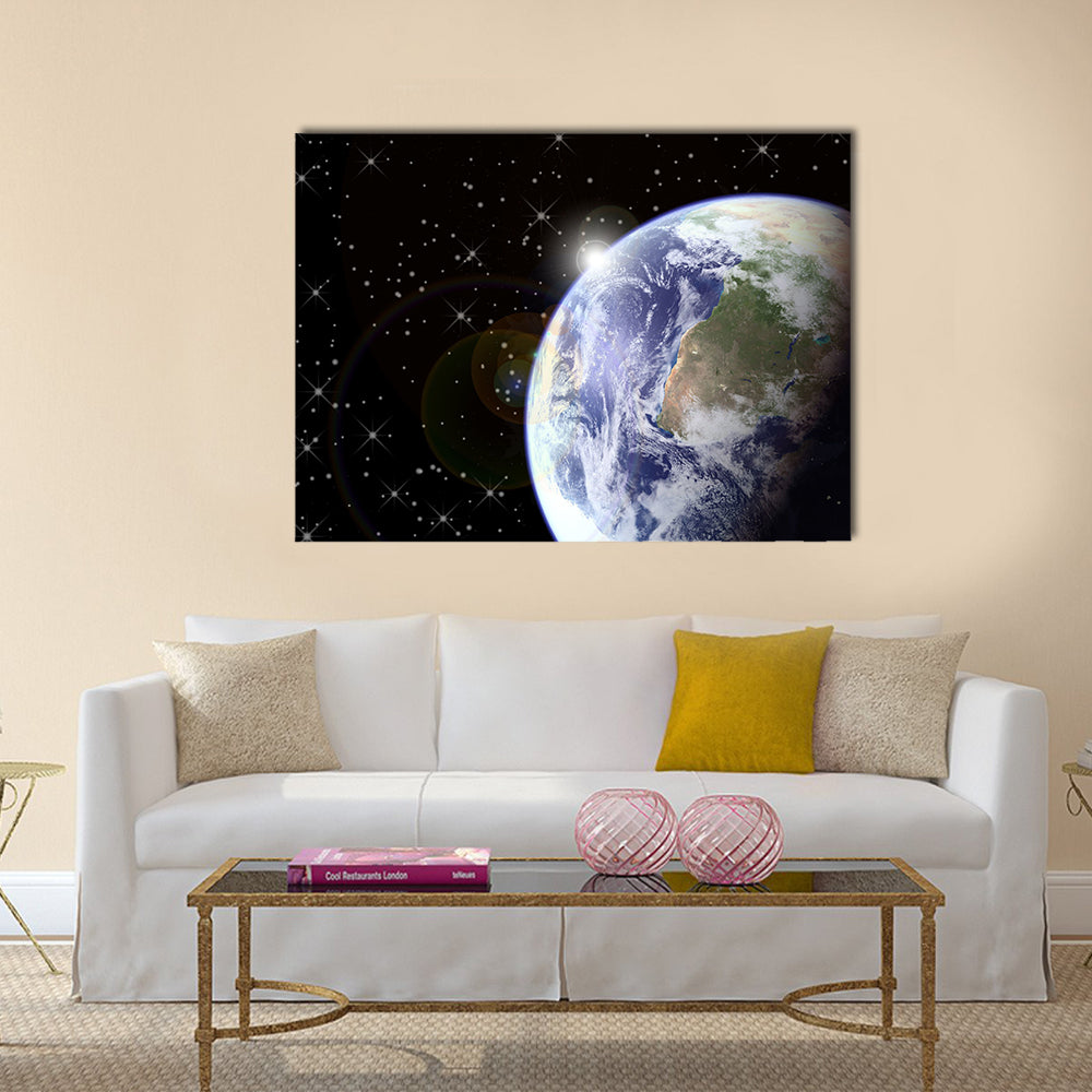 Sunrise from space. Sunburst behind the earth, generated in PS. Earth and stars seen clearly at 100% Multi Panel Canvas Wall Art
