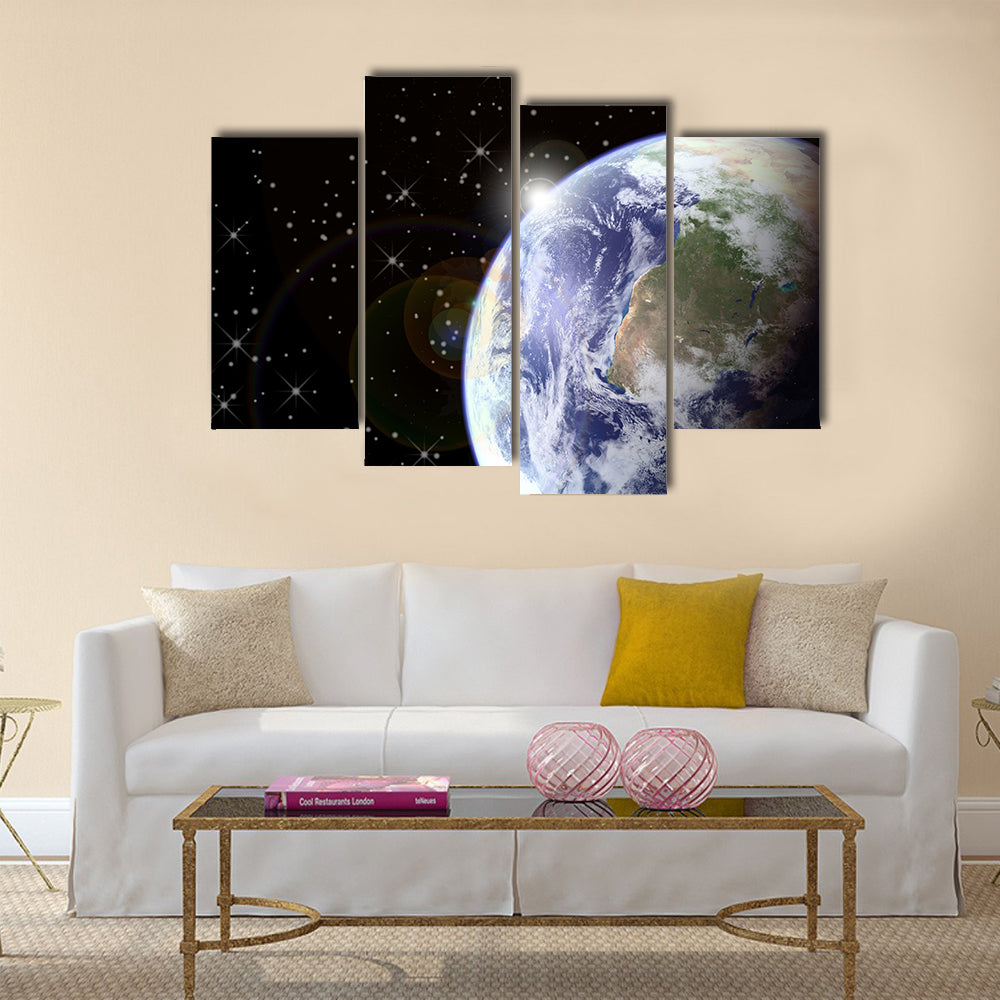 Sunrise from space. Sunburst behind the earth, generated in PS. Earth and stars seen clearly at 100% Multi Panel Canvas Wall Art