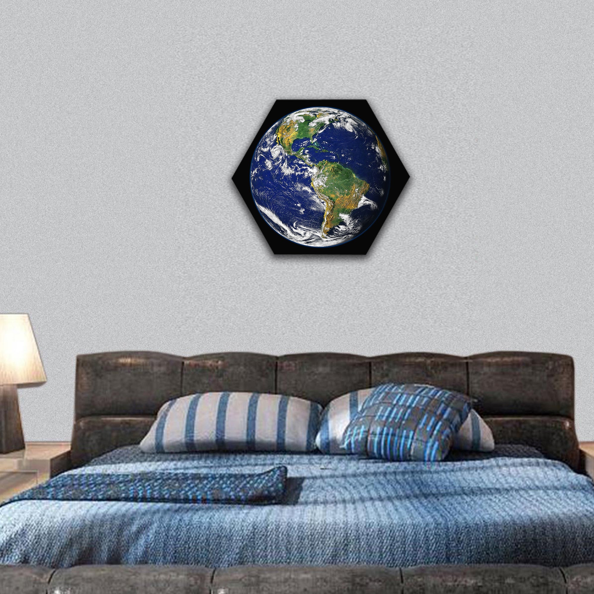 Earth, with a glowing blue atmosphere, moon in a frame hexagonal canvas wall art