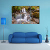 Rainforest waterfall long exposure image in lush tropical forest multi panel canvas wall art