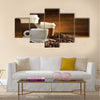 Cups of coffee with smoke and coffee beans on old wooden background Multi Panel Canvas Wall Art