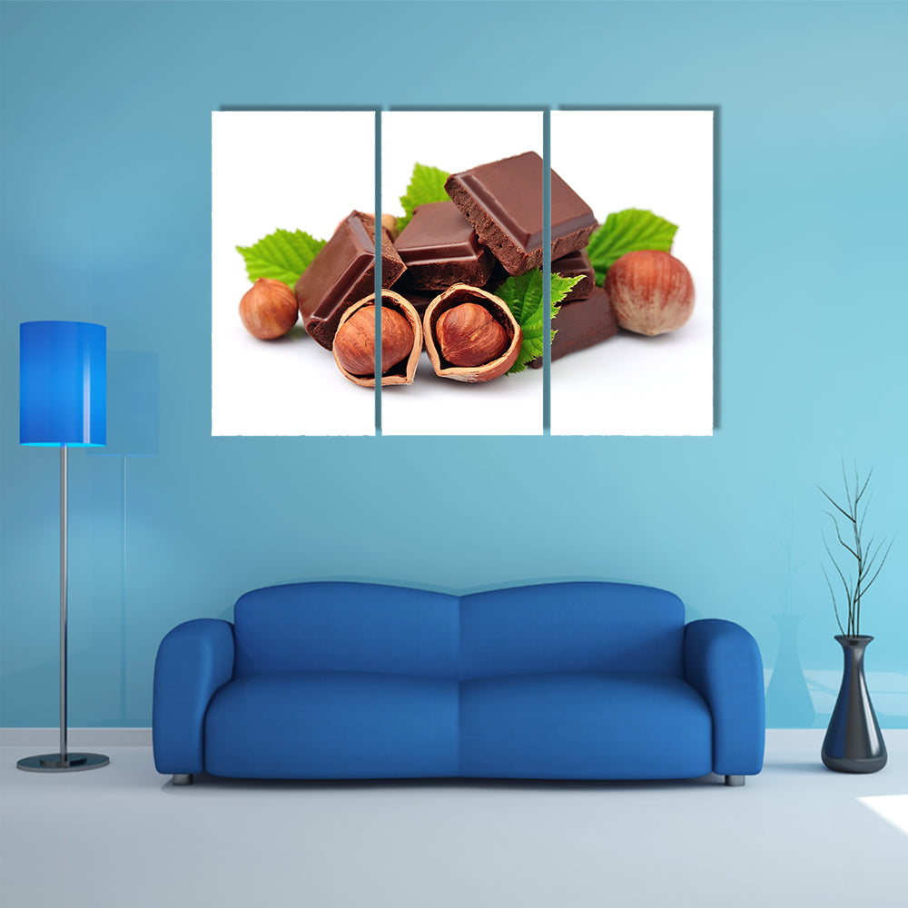 Chocolate with hazelnuts closeup Multi panel canvas wall art