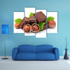 Chocolate with hazelnuts closeup Multi panel canvas wall art