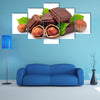 Chocolate with hazelnuts closeup Multi panel canvas wall art