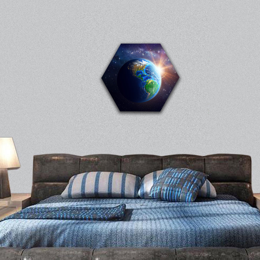 Illuminated face of Earth in space image furnished by NASA hexagonal canvas wall art
