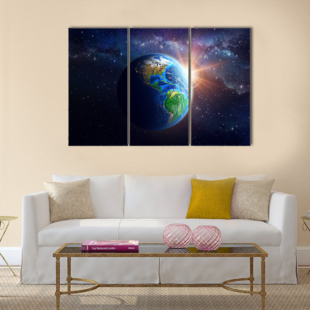 Illuminated face of the Earth in space furnished by NASA Multi Panel Canvas Wall Art