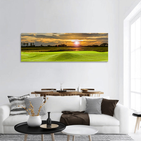 Golf ball on green panoramic canvas wall art
