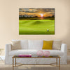 Golf ball on green Multi Panel Canvas Wall Art