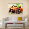 Assorted dry fruits raisins apricots figs prunes goji cranberries on a wooden background, Multi panel canvas wall art