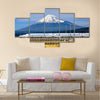 A Shinkansen bullet train passes below Mt. Fuji in Japan, Wall Art