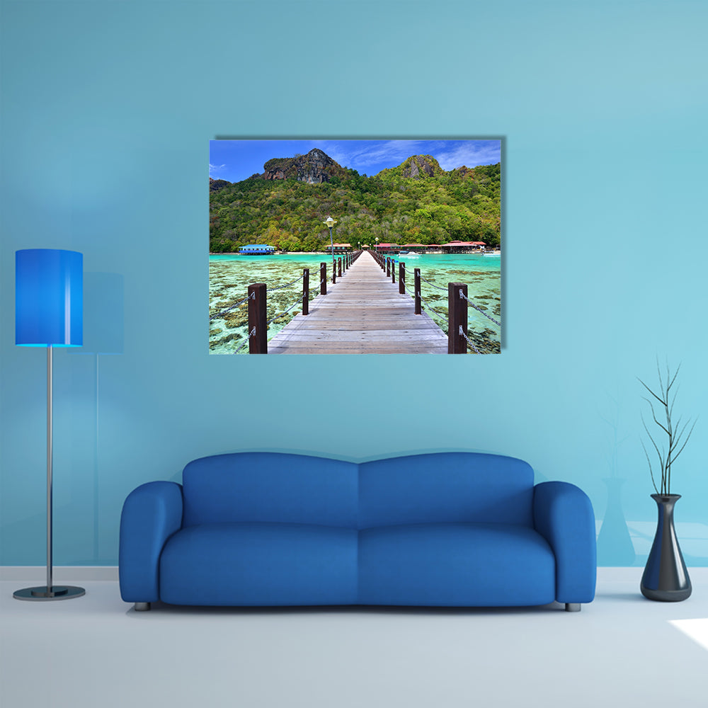 A Long wooden pier heading toward Bohey Dulang Island, Malaysia Multi Panel Canvas Wall Art
