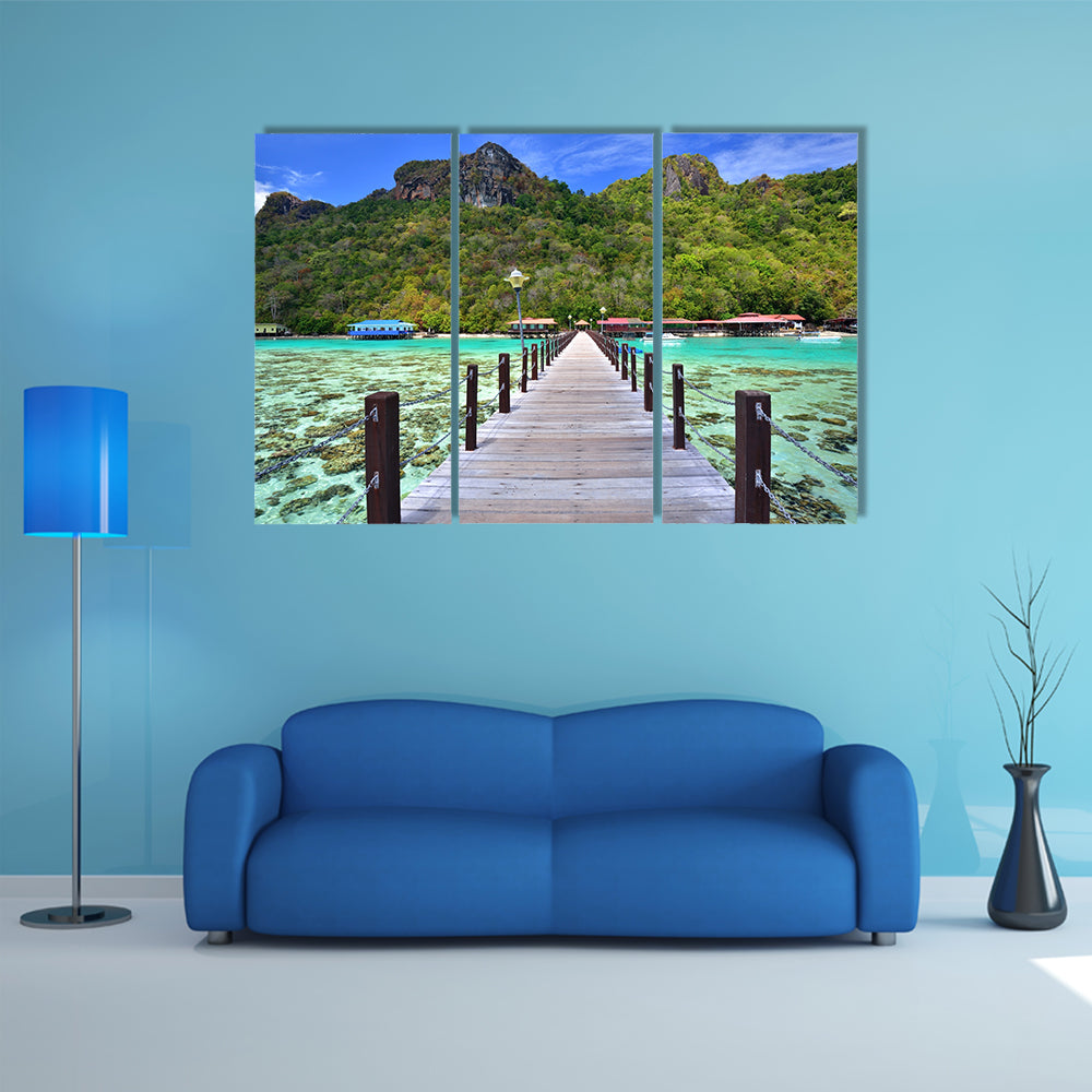 A Long wooden pier heading toward Bohey Dulang Island, Malaysia Multi Panel Canvas Wall Art