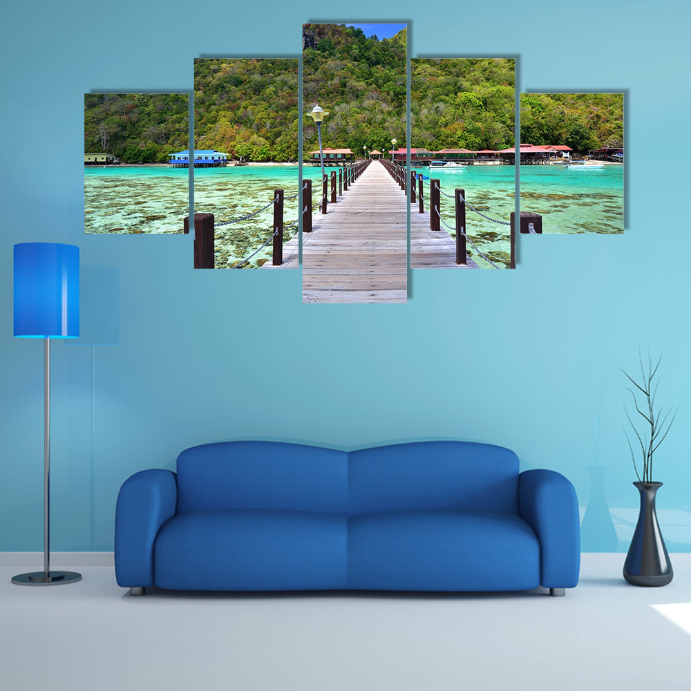 A Long wooden pier heading toward Bohey Dulang Island, Malaysia Multi Panel Canvas Wall Art