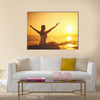 Yoga at sunset on the beach woman doing yoga performing Multi panel canvas wall art