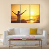 Yoga at sunset on the beach woman doing yoga performing Multi panel canvas wall art