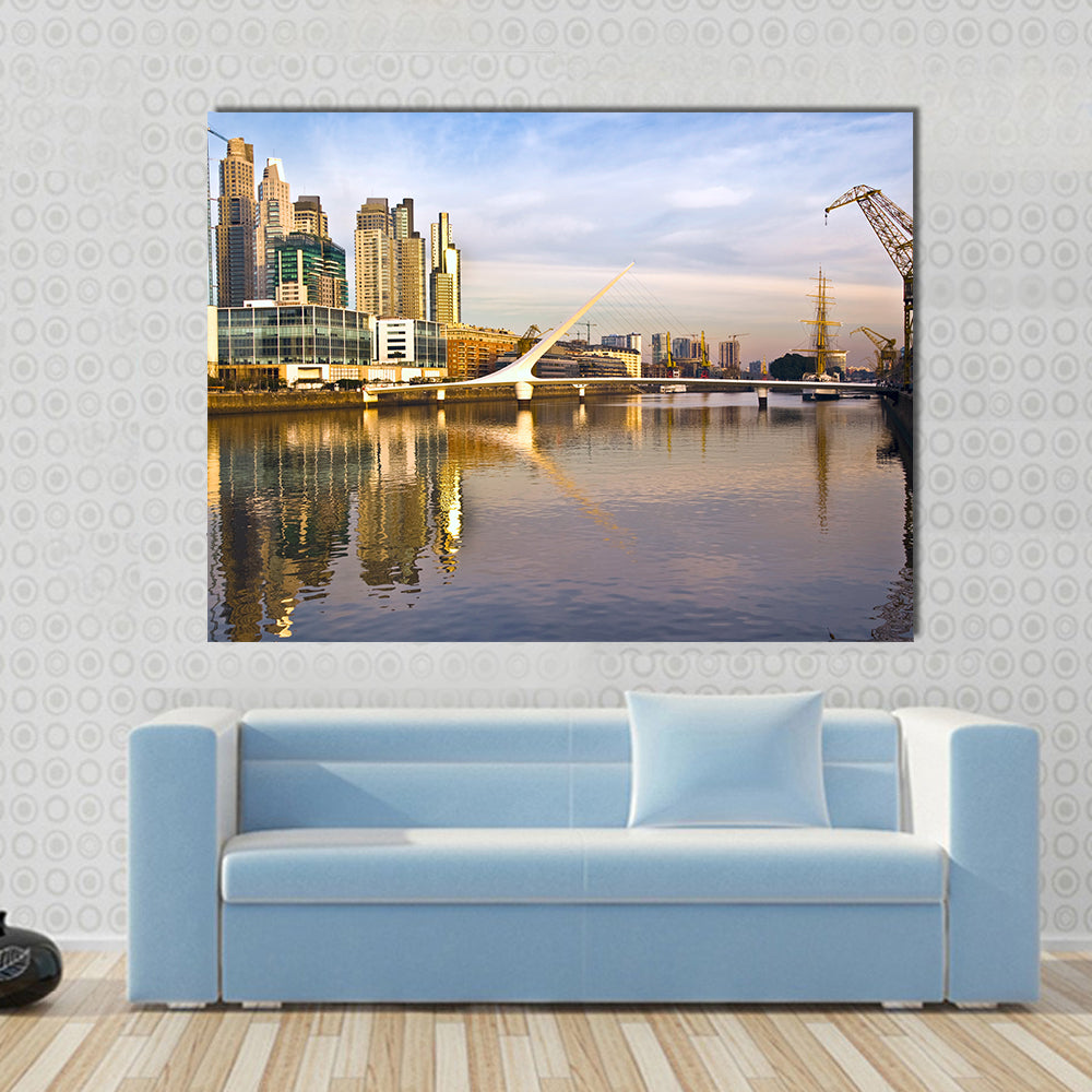 Scene Of A Lake Flowing In Front Of Yellow Building Multi Panel Canvas Wall Art
