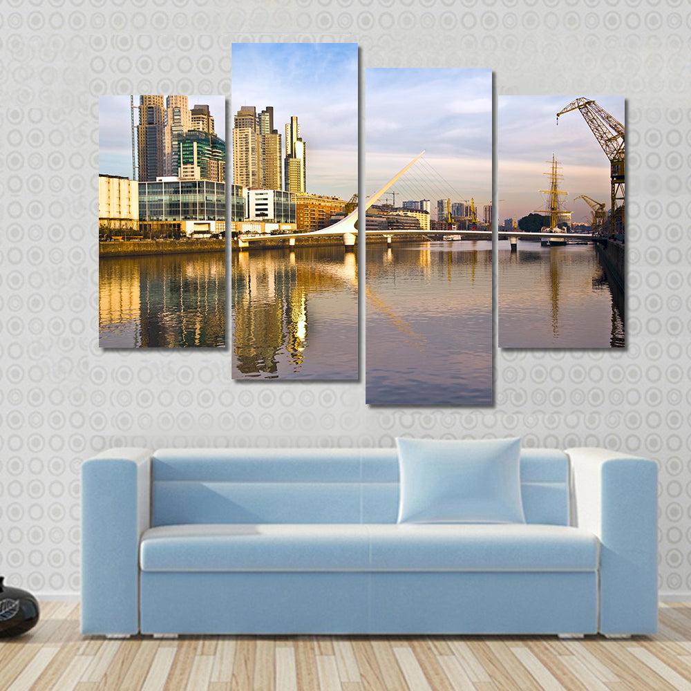 Scene Of A Lake Flowing In Front Of Yellow Building Multi Panel Canvas Wall Art