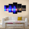 Colorful dancing fountain with mosque in the city  multi panel canvas wall art