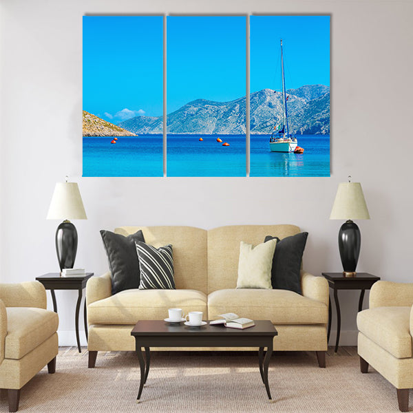Sport yacht on anchor in silent bay on Greek Island Multi Panel Canvas Wall Art